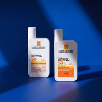 La Roche-Posay Anthelios SPF 50+ uvmune 400 флуид за лице с цвят 50 мл 797641 - Снимка 2 от 2